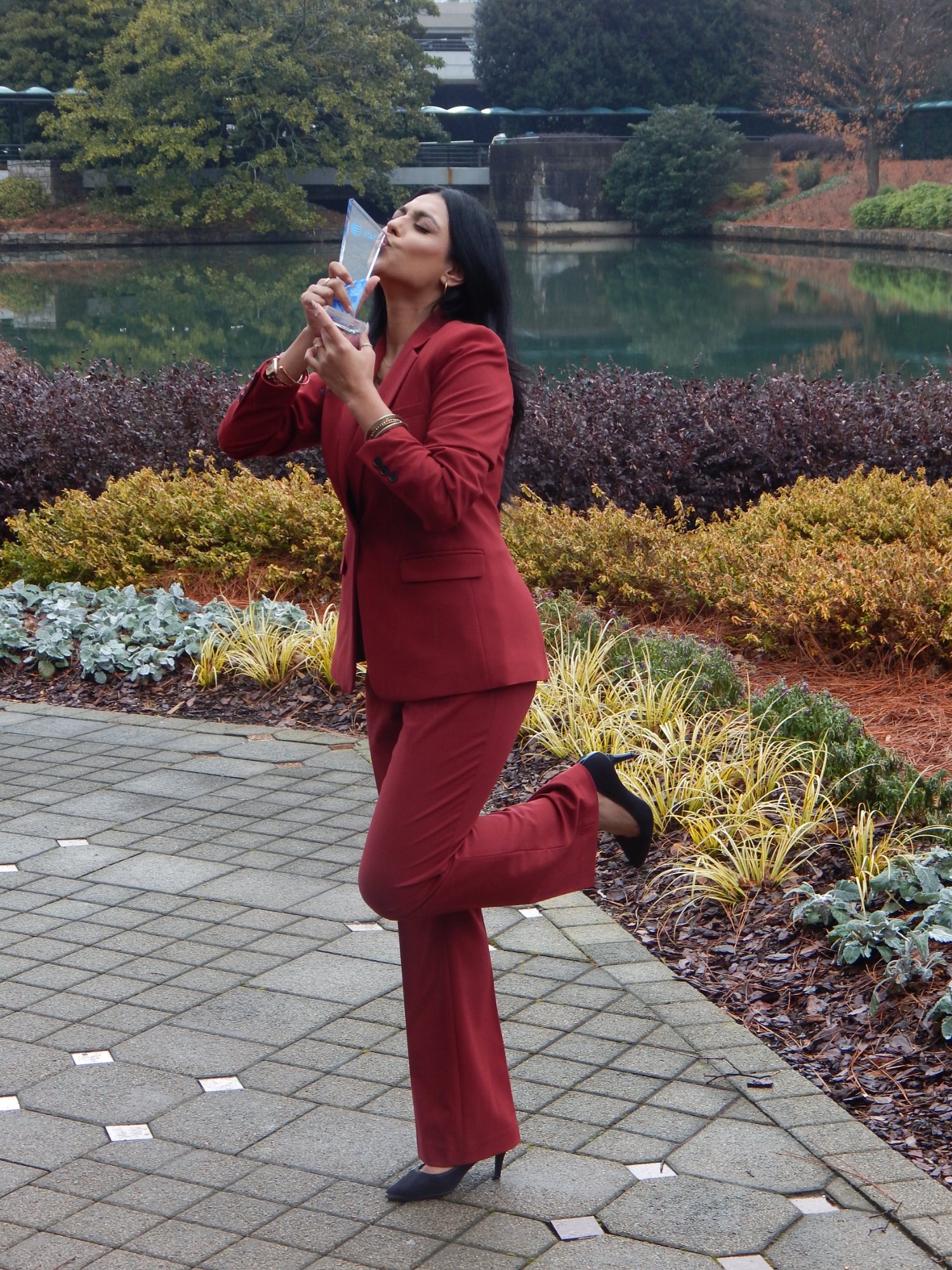 Azalea Acquisitions team member celebrating an achievement award